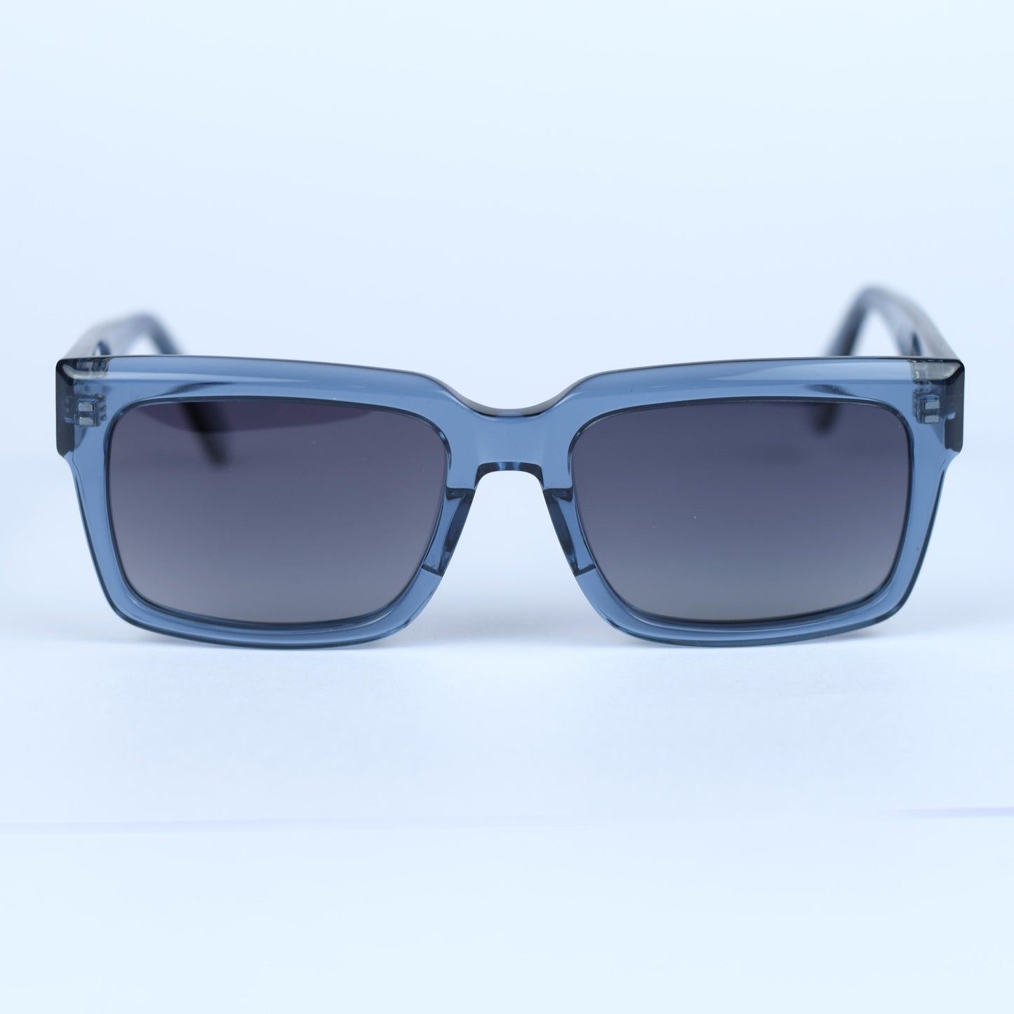 Gafas de sol unisex polarizadas con protección UV, fabricadas en material resistente de acetato.