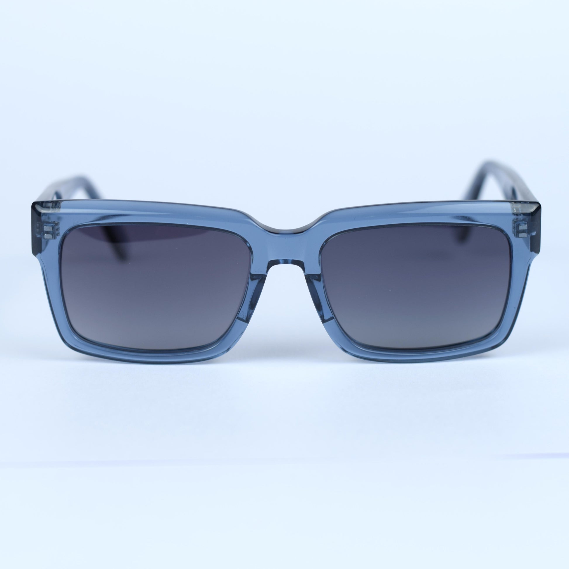 Gafas de sol unisex polarizadas con protección UV, fabricadas en material resistente de acetato.