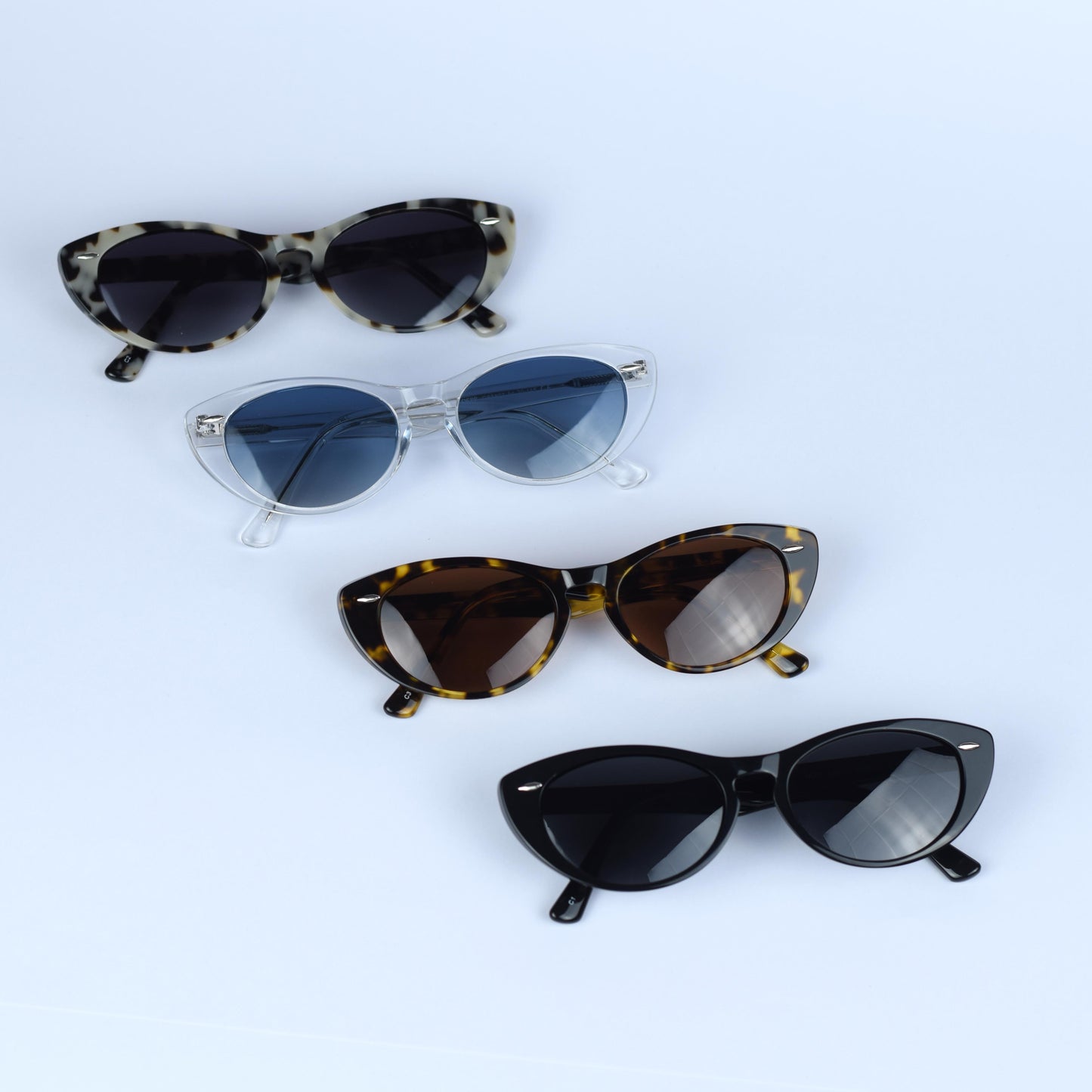 Gafas de sol unisex polarizadas con protección UV, fabricadas en material resistente de acetato.